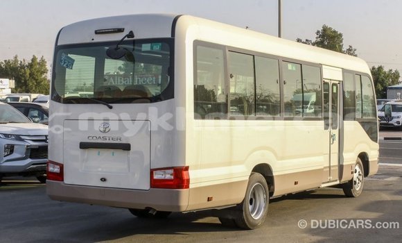 Buy Import Toyota Coaster White Car in Import - Dubai in Kampot Province Buy Import Toyota Coaster White Car in Import - Dubai in Kampot Province
