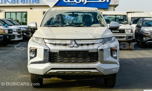 Buy Import Mitsubishi L200 White Car in Import - Dubai in Kampot Province Buy Import Mitsubishi L200 White Car in Import - Dubai in Kampot Province