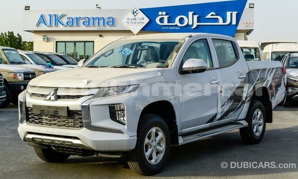 Buy Import Mitsubishi L200 White Car in Import - Dubai in Kampot Province Buy Import Mitsubishi L200 White Car in Import - Dubai in Kampot Province