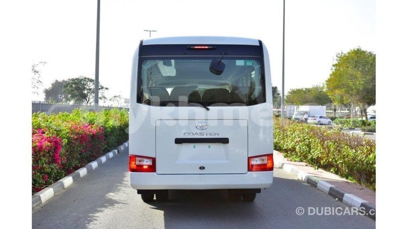 Big with watermark toyota coaster kampot province import dubai 4024