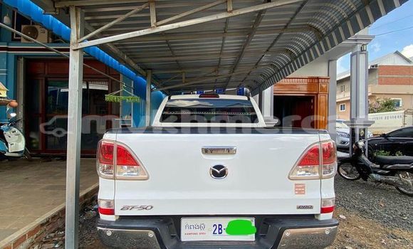 Buy Used Mazda 323 White Car in Phnom Penh in Phnom Penh Buy Used Mazda 323 White Car in Phnom Penh in Phnom Penh