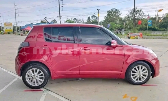 Buy Used Suzuki Swift Red Car in Samraong in Oddar Meanchey Province Buy Used Suzuki Swift Red Car in Samraong in Oddar Meanchey Province
